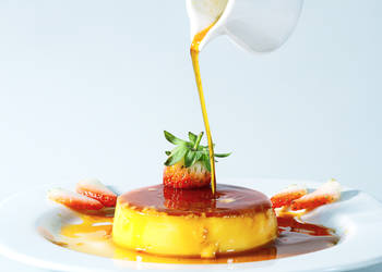 pouring caramel on top of lemon pudding