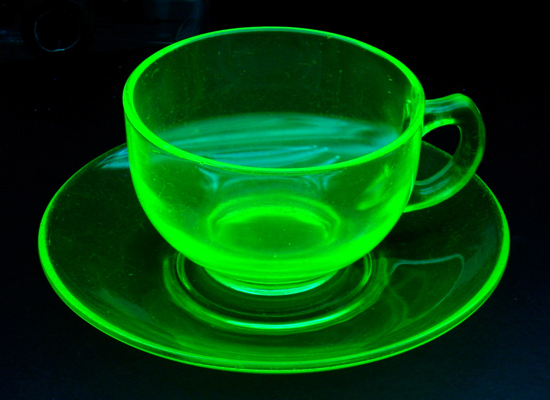 Uranium glass cup and saucer