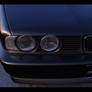 BMW e34 front at sunset.