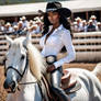 Cowgirl riding a Lipizzaner Stallion at the Rodeo