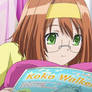Akane reading a magazine in her bedroom