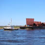 Bejan and Anna Toby transporting ship parts