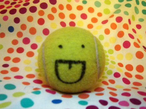 Happy Tennis Ball Laughs At You