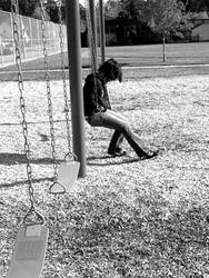 sitting on a swing