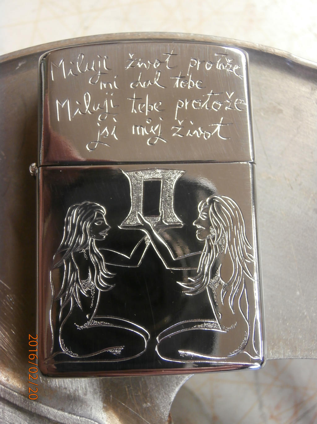 Gemini engraving on Zippo