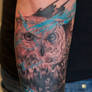 an owl tattoo