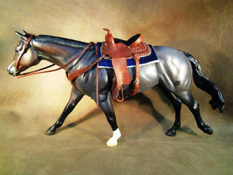 Miniature western saddle set in dark cherry