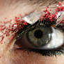 Eye red sparkles and glass