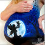 Belly painting with fairy and baby.