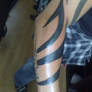 tribal tattoo lower arm