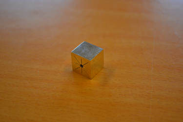 A dice made from silver plate