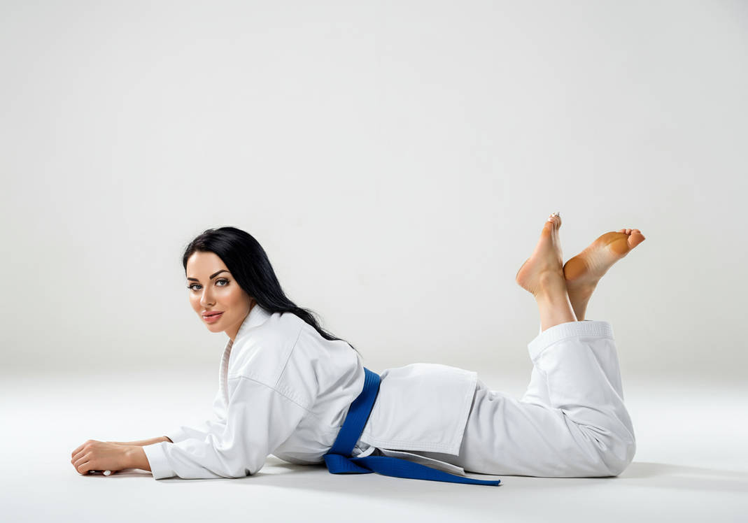 Karate Lay A gorgeous karate woman laying on her stomach by hamid0hmida on DeviantArt