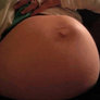 Big Belly Pregnant Woman--Baby Kicks