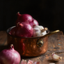Still LIfe with Copper Pot, Red Onions and Garlic