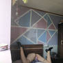 Girl trapped between the bed.