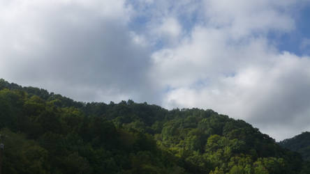 Blue Skies and Green Mountains