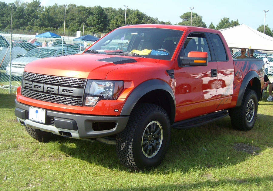 Orange Raptor by MasterxZealot on DeviantArt