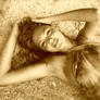 Teen Stretching Out In the Sand