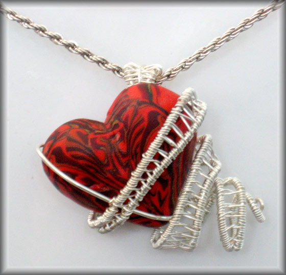 Heart Tied in Silver Ribbon