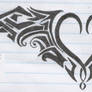 Tribal heart tatoo