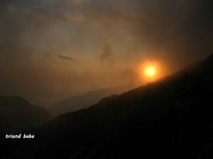 Sun set with Lahesh Cave and Triund