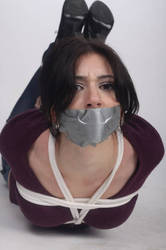 Hogtied and gagged woman 