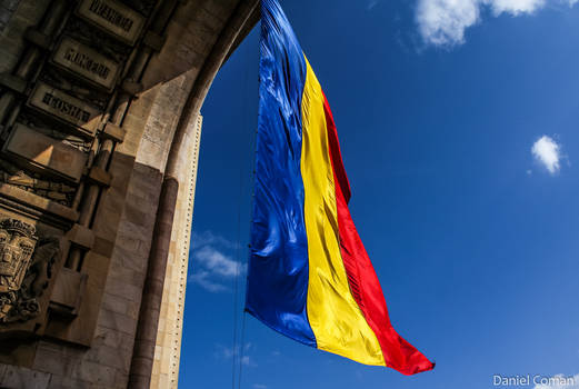 Romanian Flag and The Triumphal Arch Bucharest