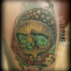 Skull acorn tattoo