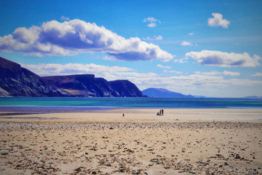 Wandering On The Beach Under The Clouds