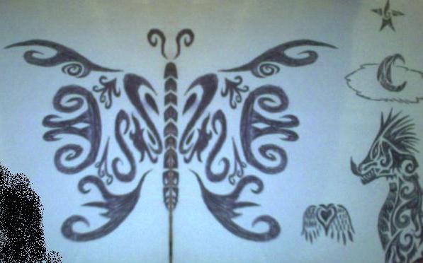 Tribal butterfly tattoo