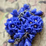 Earrings with blue flower clusters