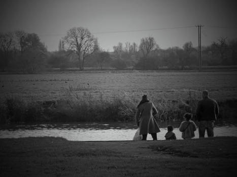 Family By The River