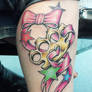 brass knuckles girl tattoo