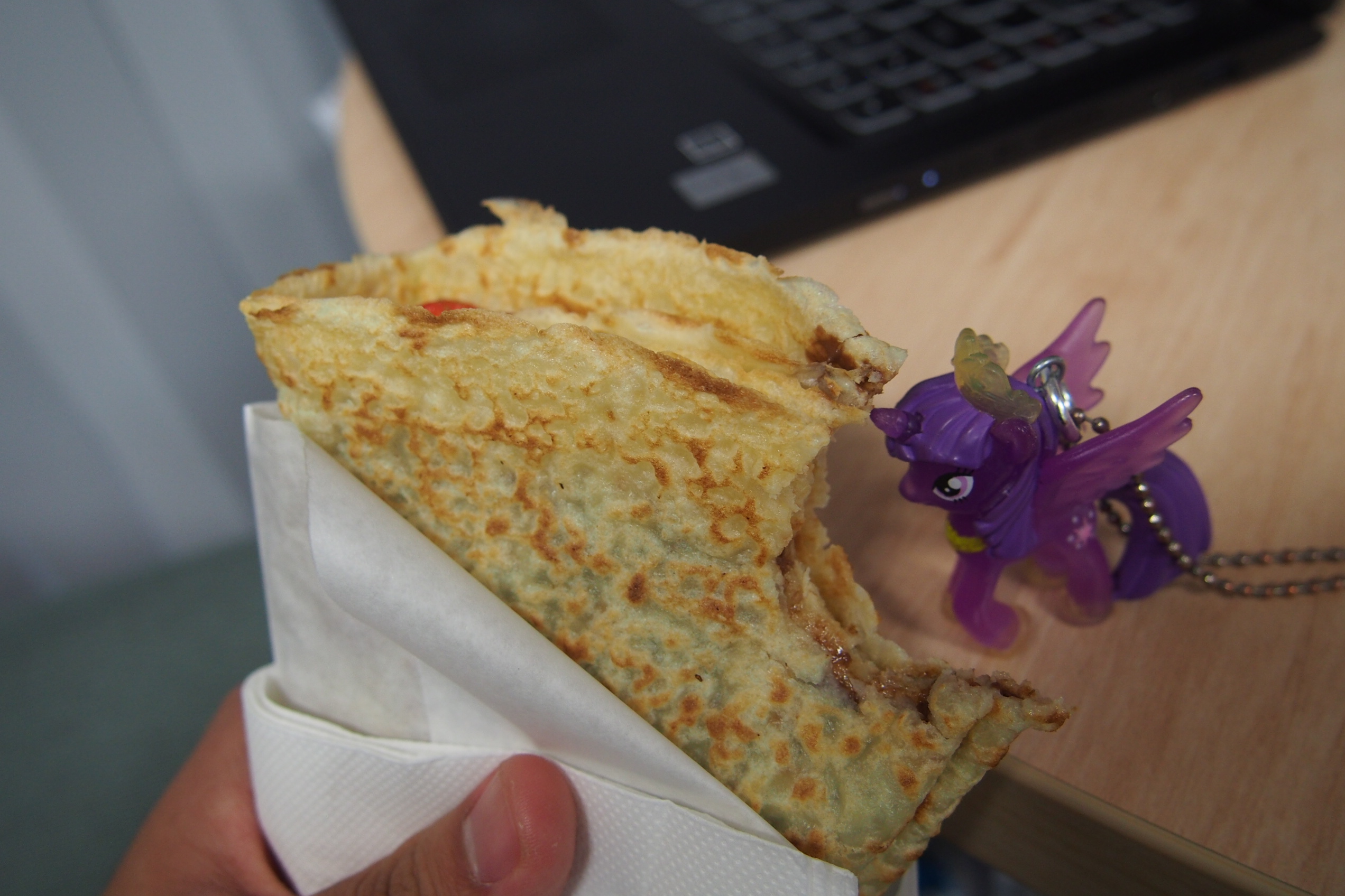 Twilight Sparkle, enjoying a crepe