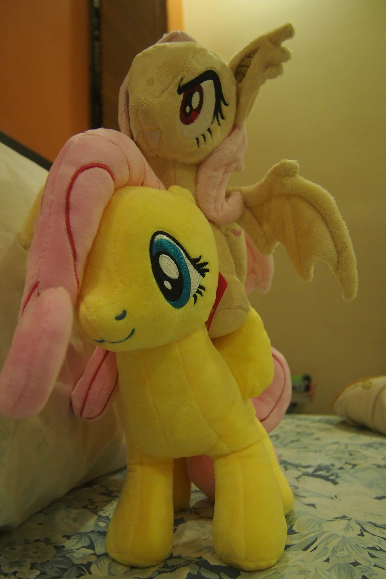 Fluttershy giving her baby sis a ride