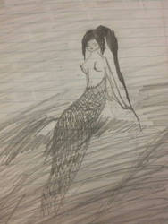 mermaid on rock