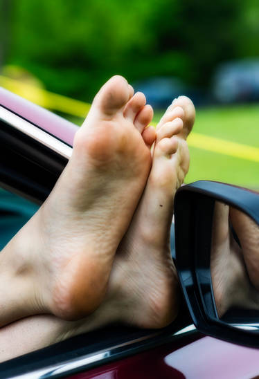 Car window and feet