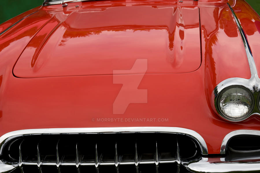 The Hood Of A Classic Red Sports Car