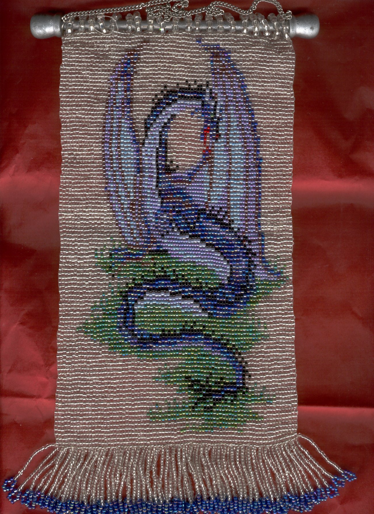 A Dragon Tapestry in Beads.