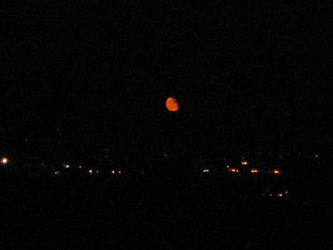 orange moon in a black sky...