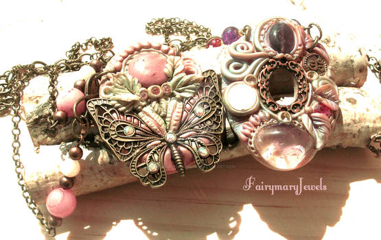 Butterfly rodonite cameo and ametrino donut