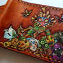 All of the Masks. Leather wallet, front