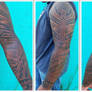 Tribal sleeve tattooed