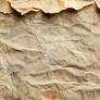An aged, vintage paper texture with subtle creases