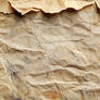 An aged, vintage paper texture with subtle creases