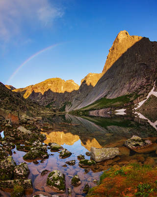 Rainbow Above Lake by DeingeL