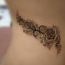 Tribal roses on side belly