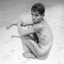 Drawing: *Young Man Crouching at the Water's Edge*