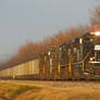 Penn Central heritage #1073 leads a coal bucket