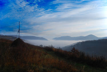 Clouds, mist and haystack